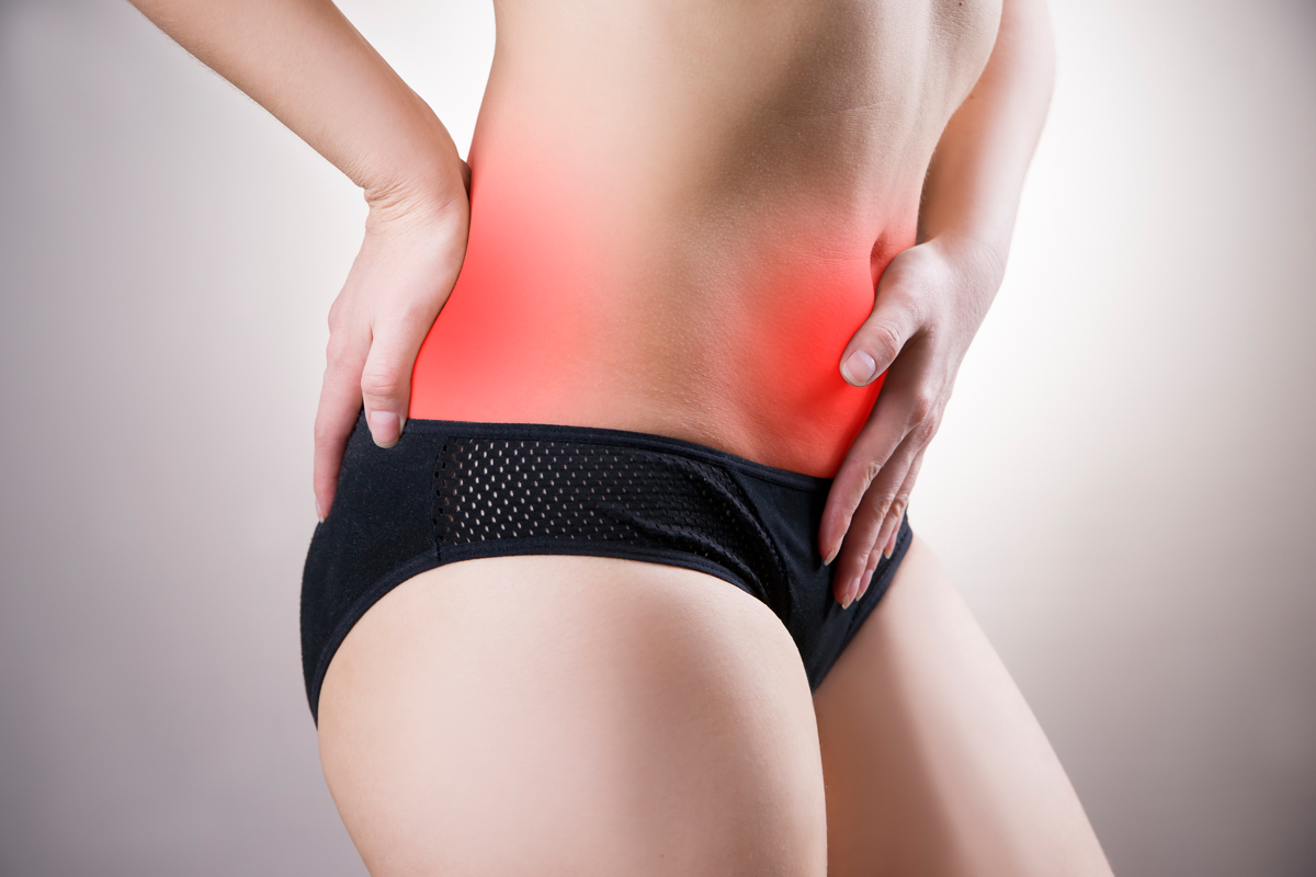 Frau mit Endometriose-Schmerzen Frau mit Endometriose-Schmerzen